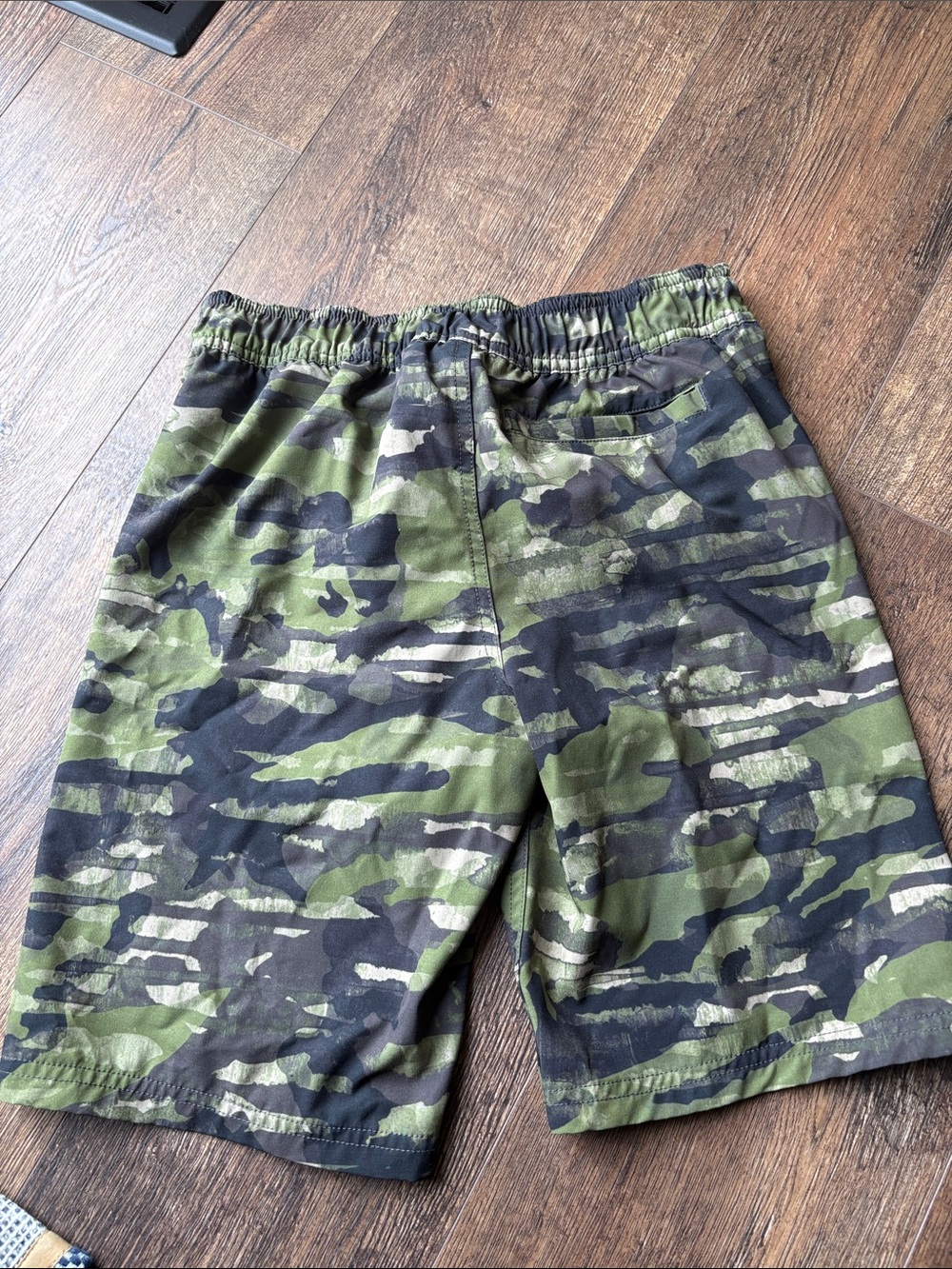 Under Armour Boys Camo Swim Shorts with Bright Orange Accents - Picture 6 of 6